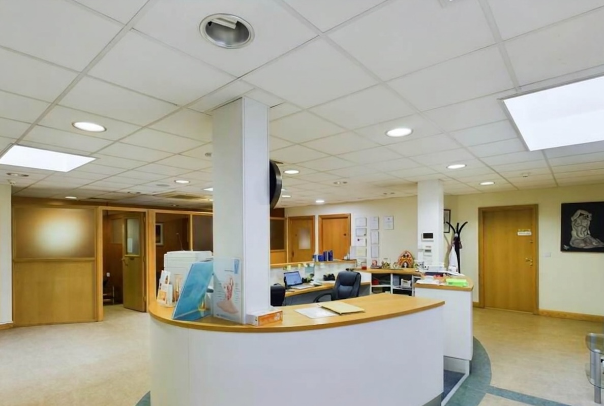 Reception area with desk and chairs
